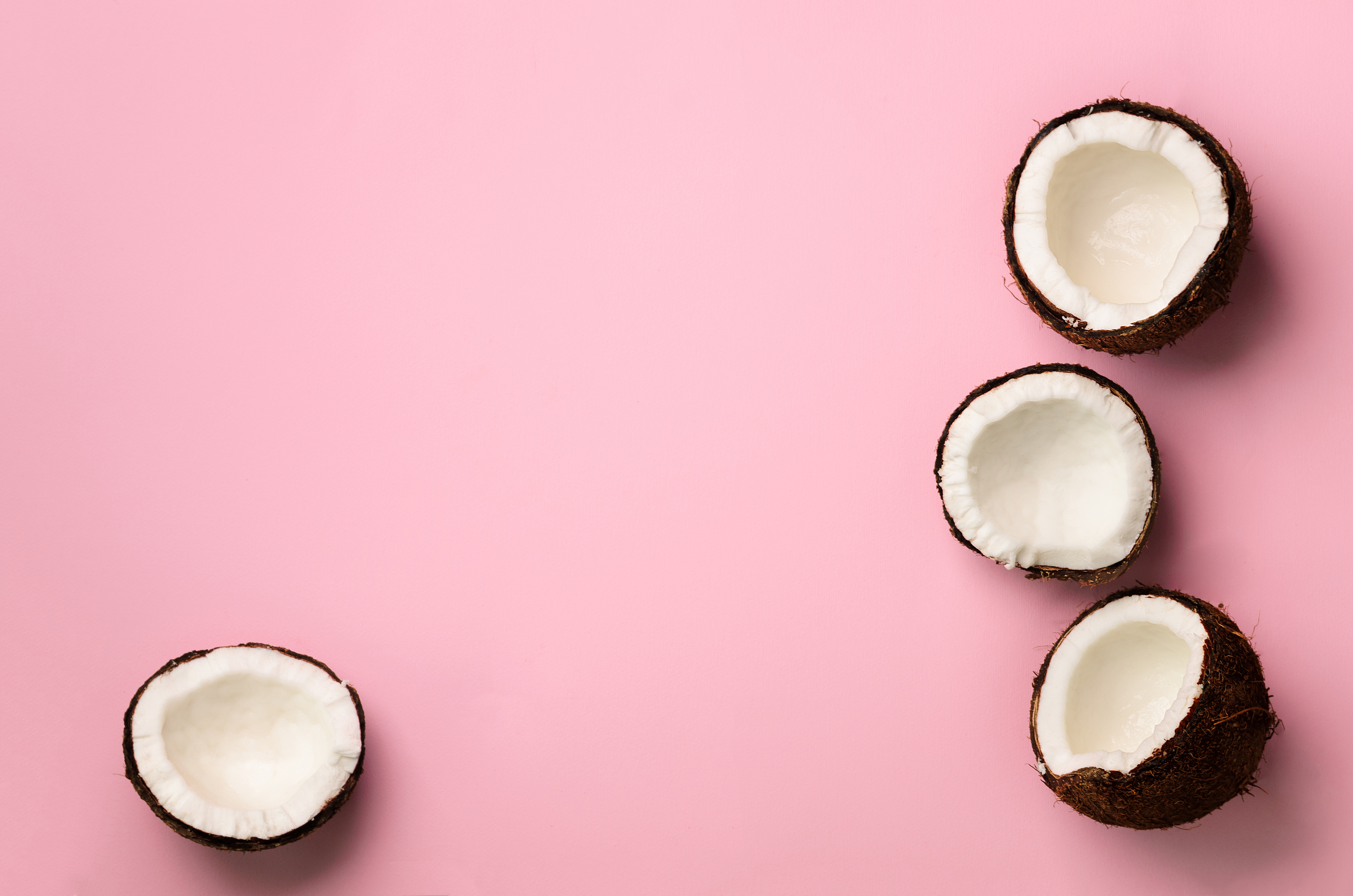 Ripe Coconuts on Pink Background